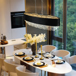 Lustre moderne en cristal eprolo avec plusieurs branches et pendentifs en cristal brillant, design élégant pour décoration intérieure.