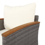 Ensemble de mobilier de patio en rotin de 9 pièces avec pieds en acacia, canapé avec coussins beiges lavables et table basse.