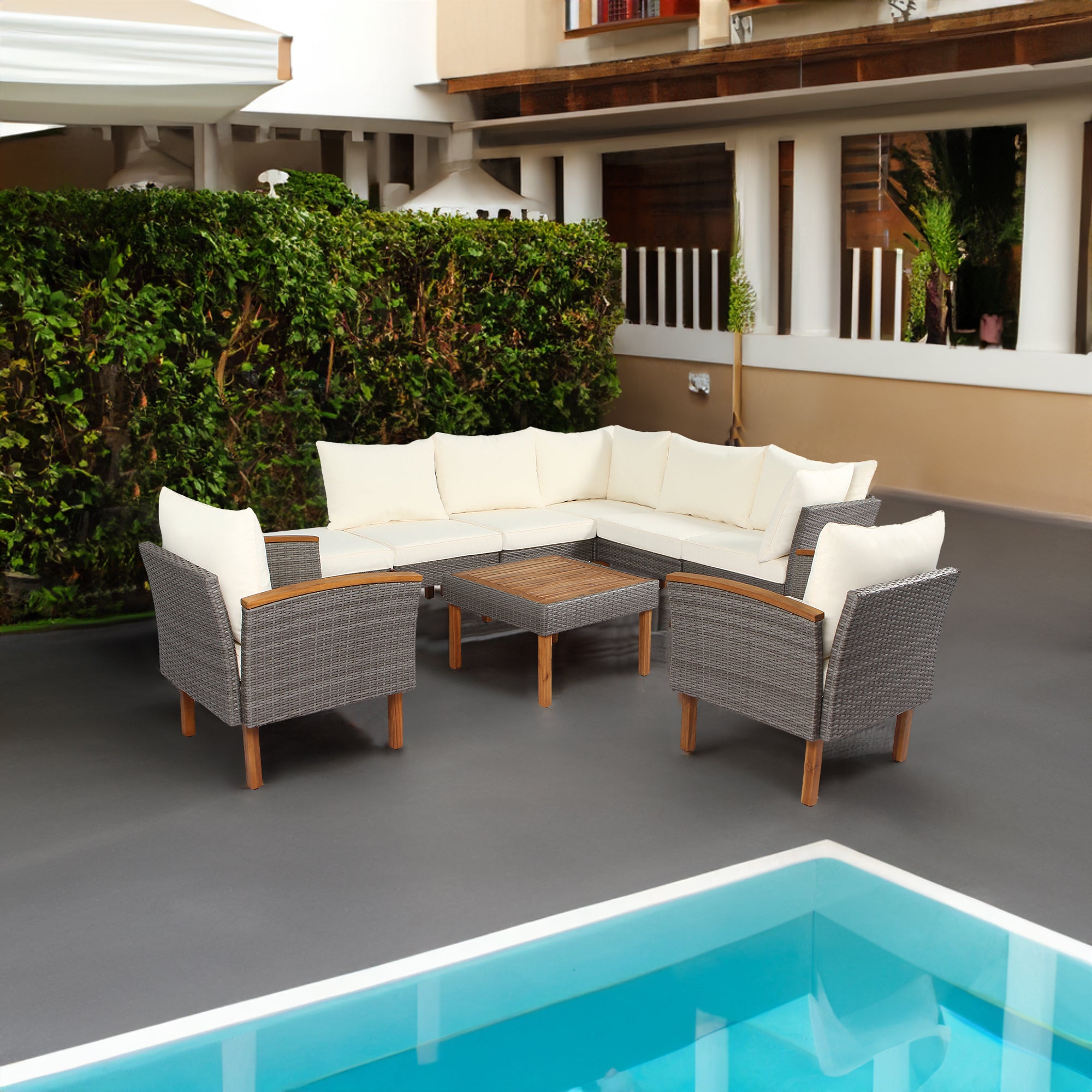 Ensemble de mobilier de patio en rotin eprolo, 9 pièces avec pieds en acacia, canapé, table basse et coussins beiges lavables.