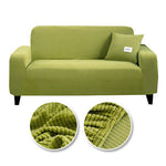 Coussin de canapé tout compris de la marque eprolo, tissu gris avec rembourrage moelleux, posé sur un canapé moderne.