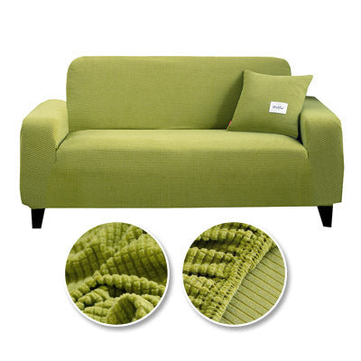 Coussin de canapé tout compris de la marque eprolo, tissu gris avec rembourrage moelleux, posé sur un canapé moderne.