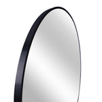 Miroir rond en métal noir de 16 pouces pour salle de bain, design moderne, par eprolo, fixé au mur avec reflet clair.