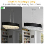 Lustre moderne en cristal de la marque eprolo avec plusieurs branches et pendentifs scintillants, suspendu dans un espace élégant.