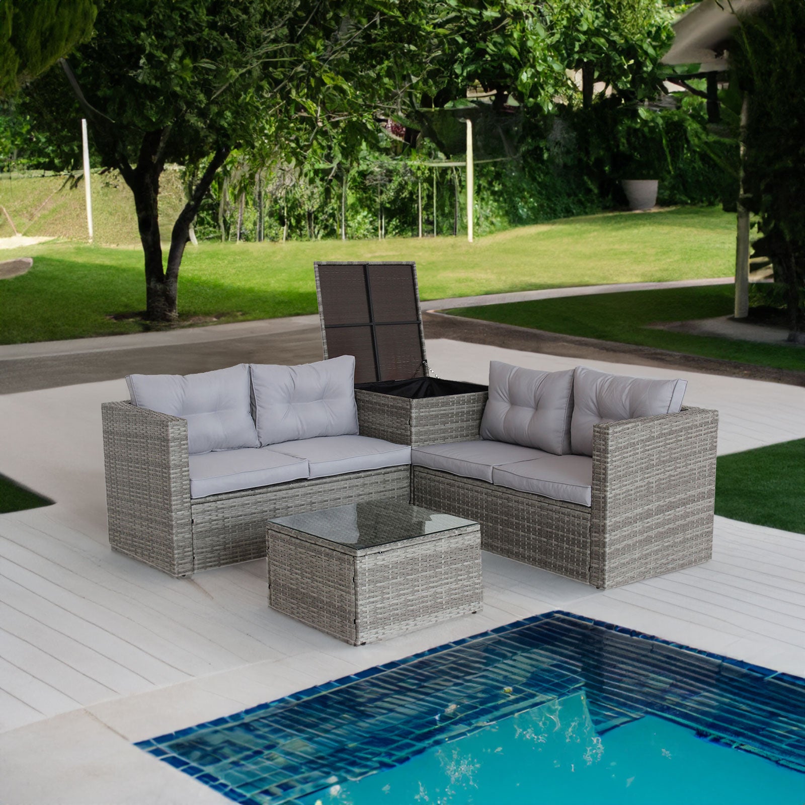 Ensemble de mobilier d'extérieur en rotin gris comprenant un canapé sectionnel, une boîte de rangement et des coussins.