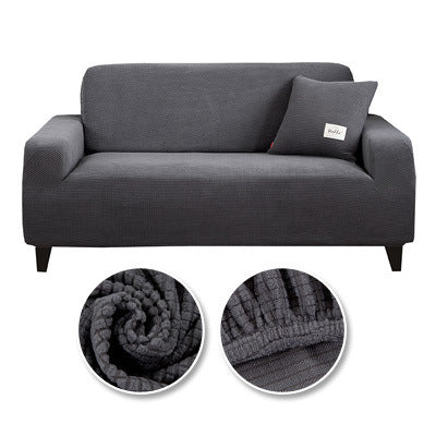 Coussin de canapé tout inclus de la marque eprolo, rembourré et confortable pour salon, vue de face avec tissu coloré.