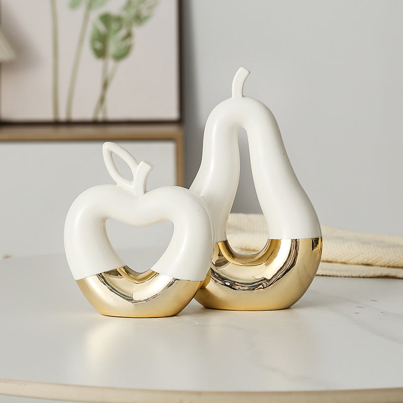 Cabinet à vin moderne en céramique dorée en forme de pomme et poire, décoration élégante pour salon ou entrée, par eprolo