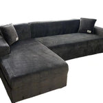 Housse de canapé élastique universelle eprolo, protection complète pour sofa, tissu extensible et ajusté, en couleur neutre visible dans l'image.
