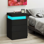 Nuit de chevet LED noire eprolo avec éclairage intégré, design moderne et surface en bois foncé visible sur l'image.