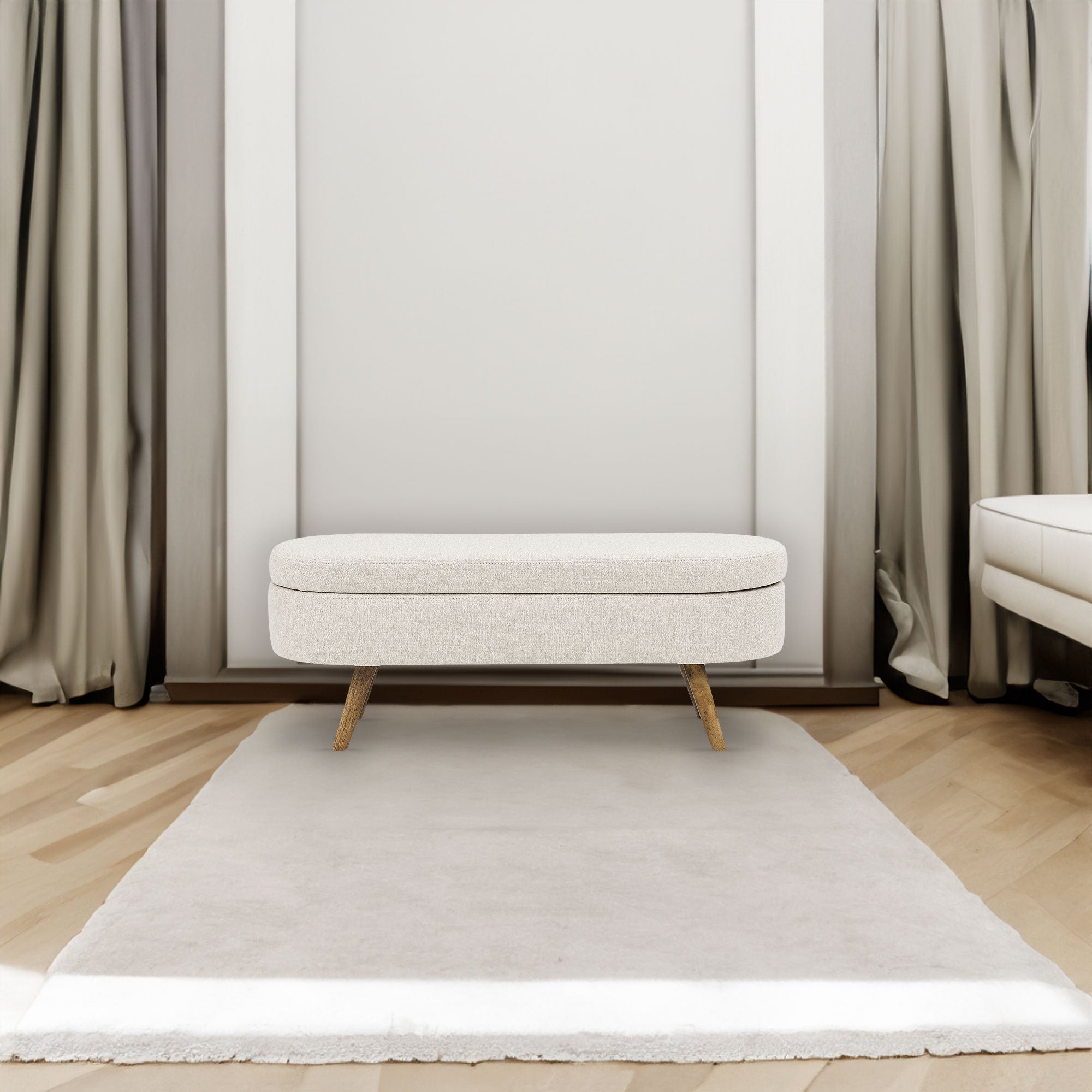 Banquette ovale de rangement beige avec pieds en bois de caoutchouc, dimensions 43,5"x16"x16", style moderne et fonctionnel.