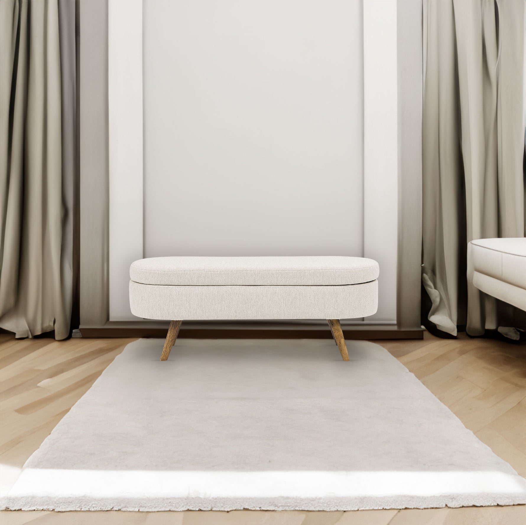 Banquette ovale de rangement beige avec pieds en bois de caoutchouc, dimensions 43,5"x16"x16", style moderne et fonctionnel.