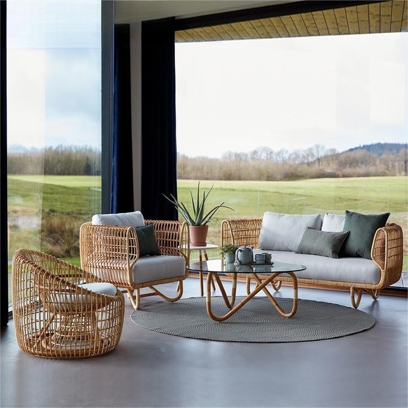 Salon d'extérieur Novah avec canapé en rotin tressé, fauteuil et table basse pour terrasse ou jardin