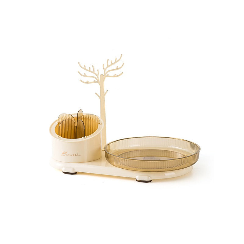 Boîte de rangement cosmétique eprolo avec compartiments pour bijoux, pinceaux, rouge à lèvres et maquillage sur un meuble tournant
