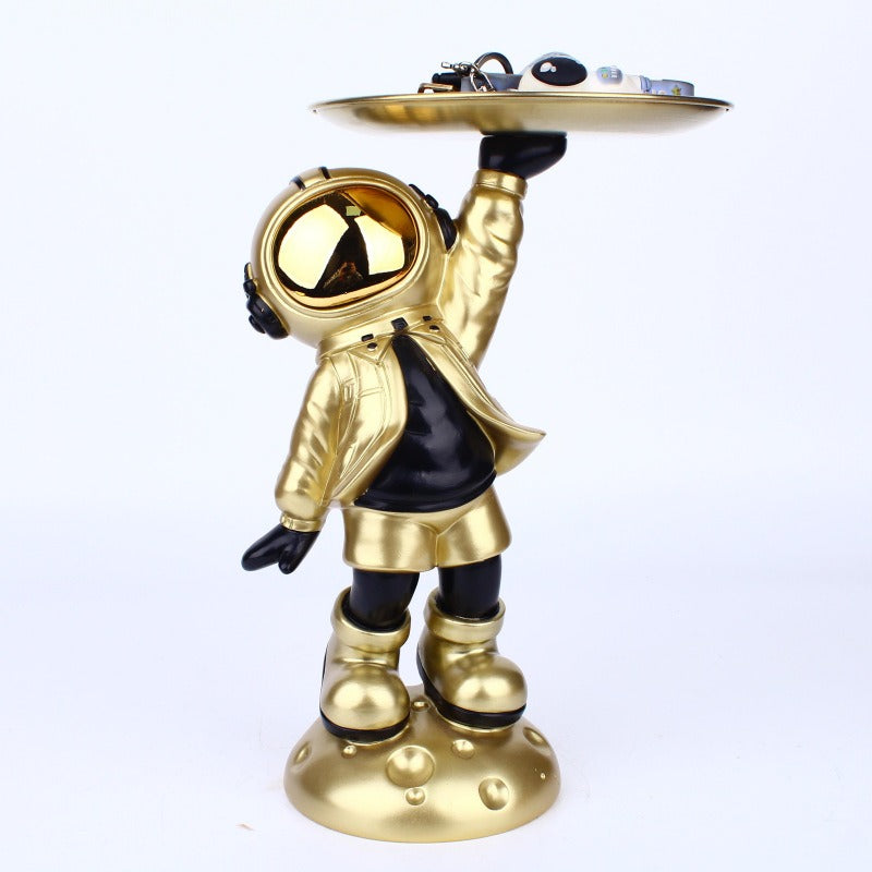 Décor de salon avec figurine d'astronaute scandinave créatif, meuble de rangement pour vin ou télévision, style moderne et original.