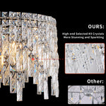 Lustre rond en cristal argenté de luxe de la marque eprolo, avec des détails en verre brillant suspendus.