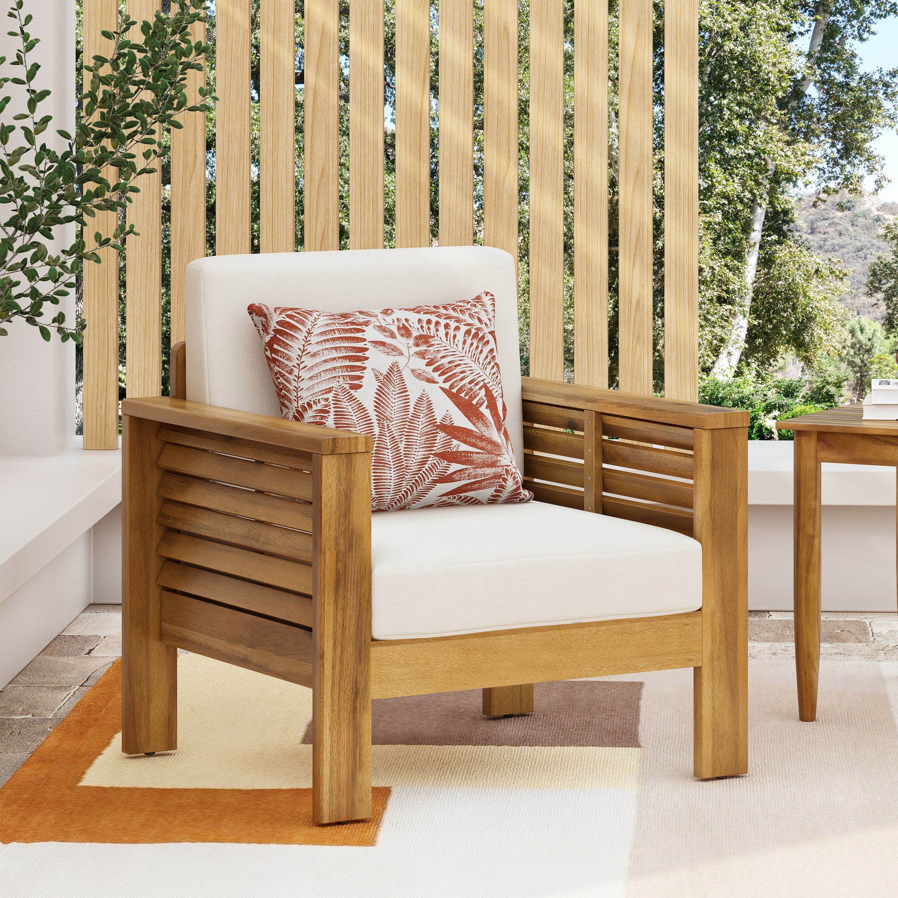 Table en acacia extérieure de marque eprolo, en bois massif avec finition naturelle visible sur l'image.