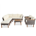 Ensemble de mobilier de patio en rotin eprolo avec table en acacia, canapé avec coussins beiges lavables et table basse.