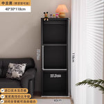 Bibliothèque eprolo noire avec compartiments de rangement, meuble de sol moderne pour chambre ou salon avec grille.