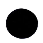 Tapis rond coloré en peluche moderne de la marque Novah, parfait pour salon, chambre ou salle d'enfants.