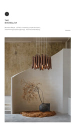 Lustre en bois de style ferme pour restaurant, modèle Novah, avec plusieurs branches et bougies en cire.