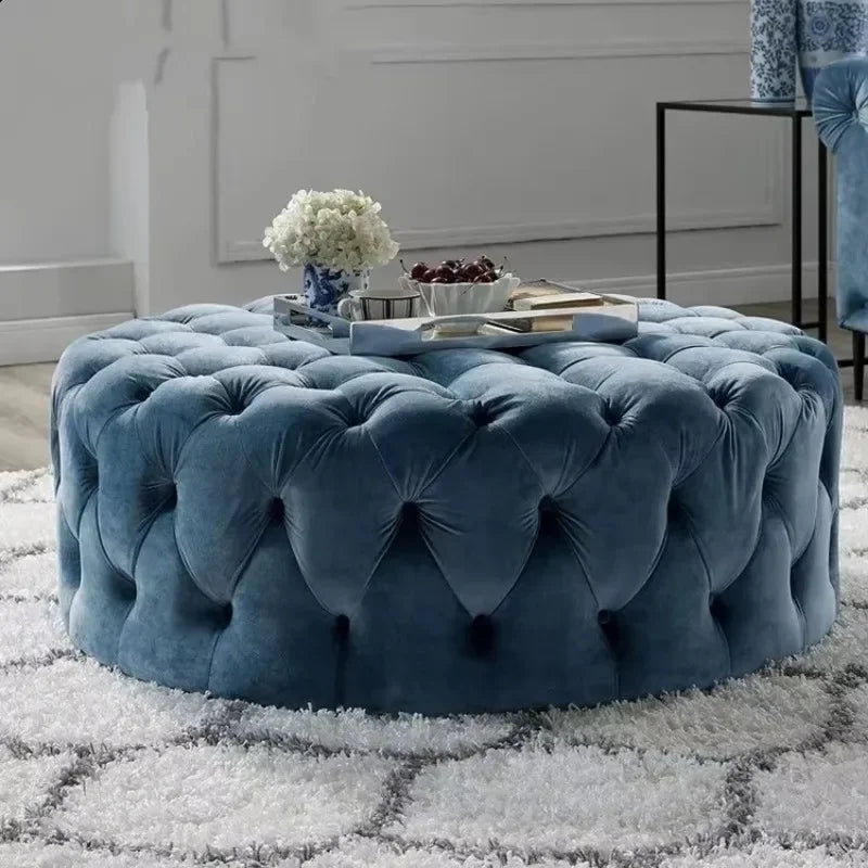 Pouf rond moderne en velours de la marque Novah, design élégant et finition douce, idéal pour salon ou chambre.