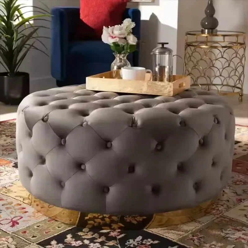 Pouf rond en velours moderne de la marque Novah, assise élégante avec finition douce et tissu velouté.